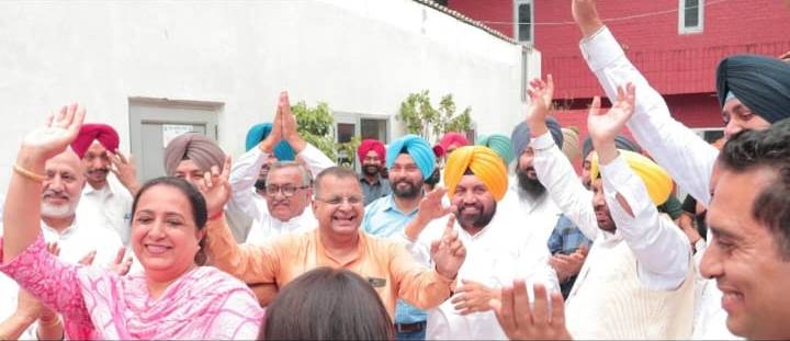 Harchand Singh Burst congratulates Sanjeev Arora and Gopal Italia who won the by-election